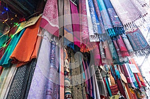 Colorful pashmina shawls and scarves. Local art and craft from yak wool