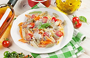 Colorful pasta and and white wine