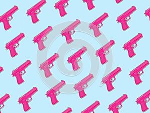 Colorful pastel pattern made of pink handguns. Minimal creative concept