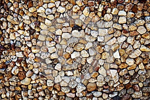 Colorful pattern of decorative brown grey slate stone wall surface, background, texture, pattern