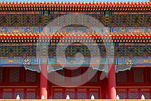 Colorful pattern of red walls inside the Palace Museum, in Beijing, China, known also as the Forbidden City, with shades