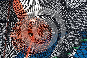 Colorful pattern of ropes on a fish net in Westhaven port photo