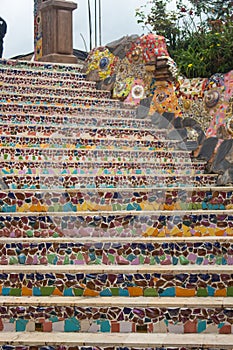 Colorful pattern of stairs from broken ceramic tile