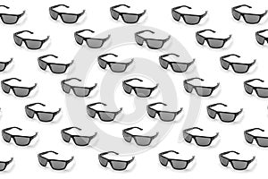 Colorful pattern of sunglasses on a white background top view