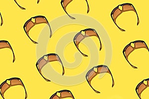 Colorful pattern of sunglasses on a yellow background top view