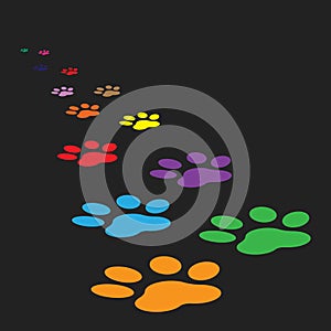 Colorful paw print icon vector illustration isolated on black ba