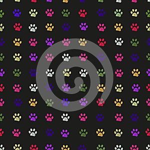 Colorful paw prints seamless fabric design pattern with black background