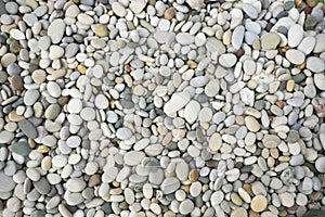 Colorful pebbles background. Stones on the beach.