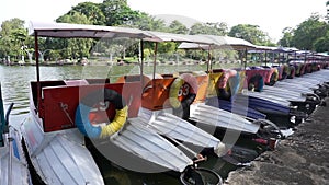 Colorful pedal boats parked