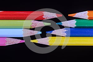 ÃâColorful pencils against a black background