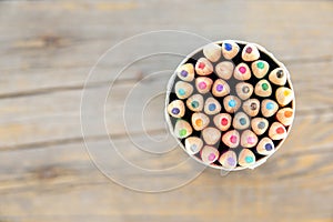 Colorful pencils as smiling faces people on wood isolated. Social networking communication concept.