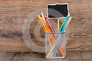 Colorful pencils in basket