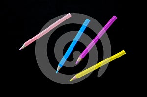 Colorful pencils on black background. Color pencils or crayons for children art.