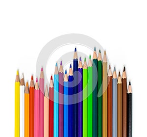 Colorful pencils of different lengths in a row isolated on a white background