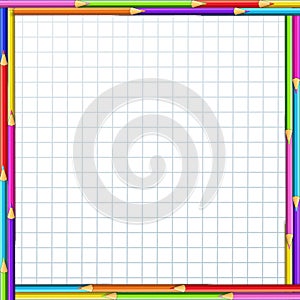 Colorful pencils frame on notebook sheet of white checkered graphing paper