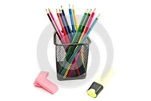 Colorful pencils, marker and erasers