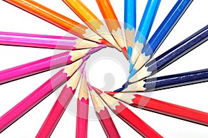 colorful pencils in spin shape of sun