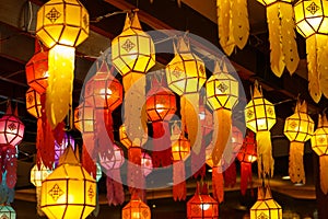 Colorful perspective view of Thai Lanna style lanterns to hanging on the ceiling and turn on light at night