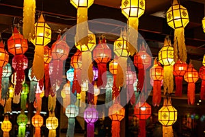 Colorful perspective view of Thai Lanna style lanterns to hanging on the ceiling and turn on light at night