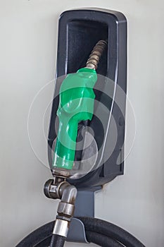 Colorful Petrol pump filling nozzles, Gas station in a service