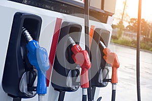 Colorful Petrol pump filling nozzles isolated on white background , Gas station in a service