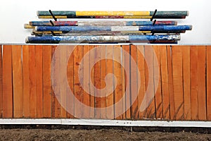 Colorful photo of equestrian obstacles. Empty field for horse jumping event competition