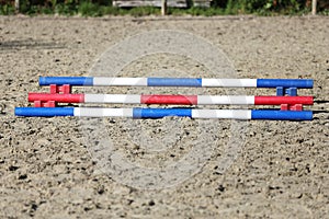 Colorful photo of equestrian obstacles. Empty field for horse jumping event competition