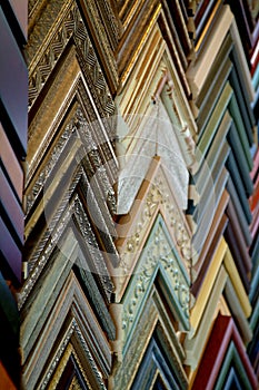 Colorful Picture Frame Samples Hanging on a Wall.