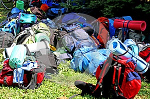 Colorful pile of backpack of Scouts during an excursion in the n