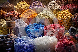 Colorful piles of spices in Dubai souks, UAE