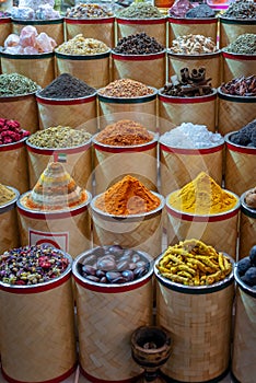 Colorful piles of spices in Dubai souks United Arab Emirates