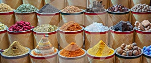 Colorful piles of spices in Dubai souks, UAE photo