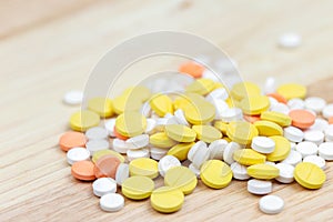 Colorful pills and drugs in close up. Assorted pills and drugs in medicine. Opioid and prescription medication addiction epidemic