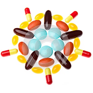 Colorful pills on white background