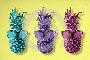 Colorful pineapple fruit with hipster sunglasses