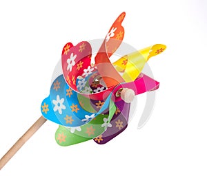 Colorful pinwheel, spinning toy with wooden stick