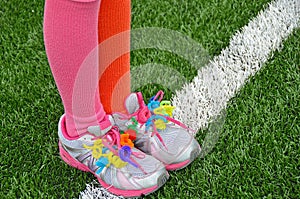 Colorful pipe cleaners on sport shoes