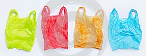 Colorful plastic bags on white background