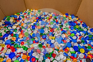 Colorful plastic bottle caps. Plastic bottle caps of different colors. Background of lots of plastic caps. Group of