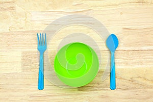 Colorful plastic bowl and Cutlery