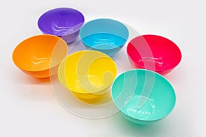 Colorful plastic bowl isolated on white