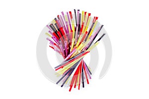 Colorful plastic cocktail straws, many plastic drinking pipes, plastic tubes for beverages on white background isolated close up