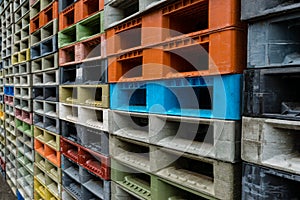Colorful plastic containers pallets stack