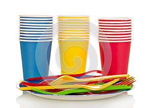 Colorful plastic cups and forks isolated on white