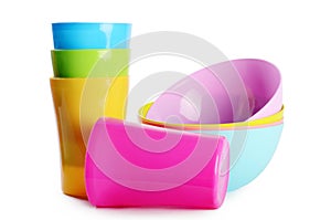 Colorful plastic cups and plates