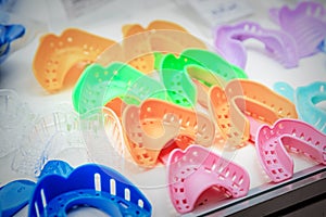 Colorful plastic dental impression trays