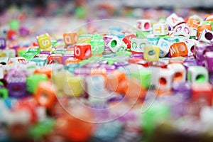 Colorful Plastic dice, cubes with letters image photo