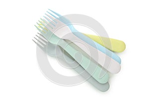 Colorful plastic forks isolated on white background