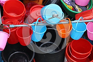 Colorful plastic made bowl and buckets selling on local market.