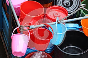 Colorful plastic made bowl and buckets selling on local market.